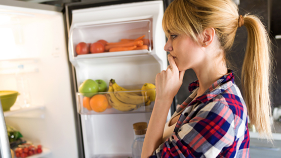 woman at fridge