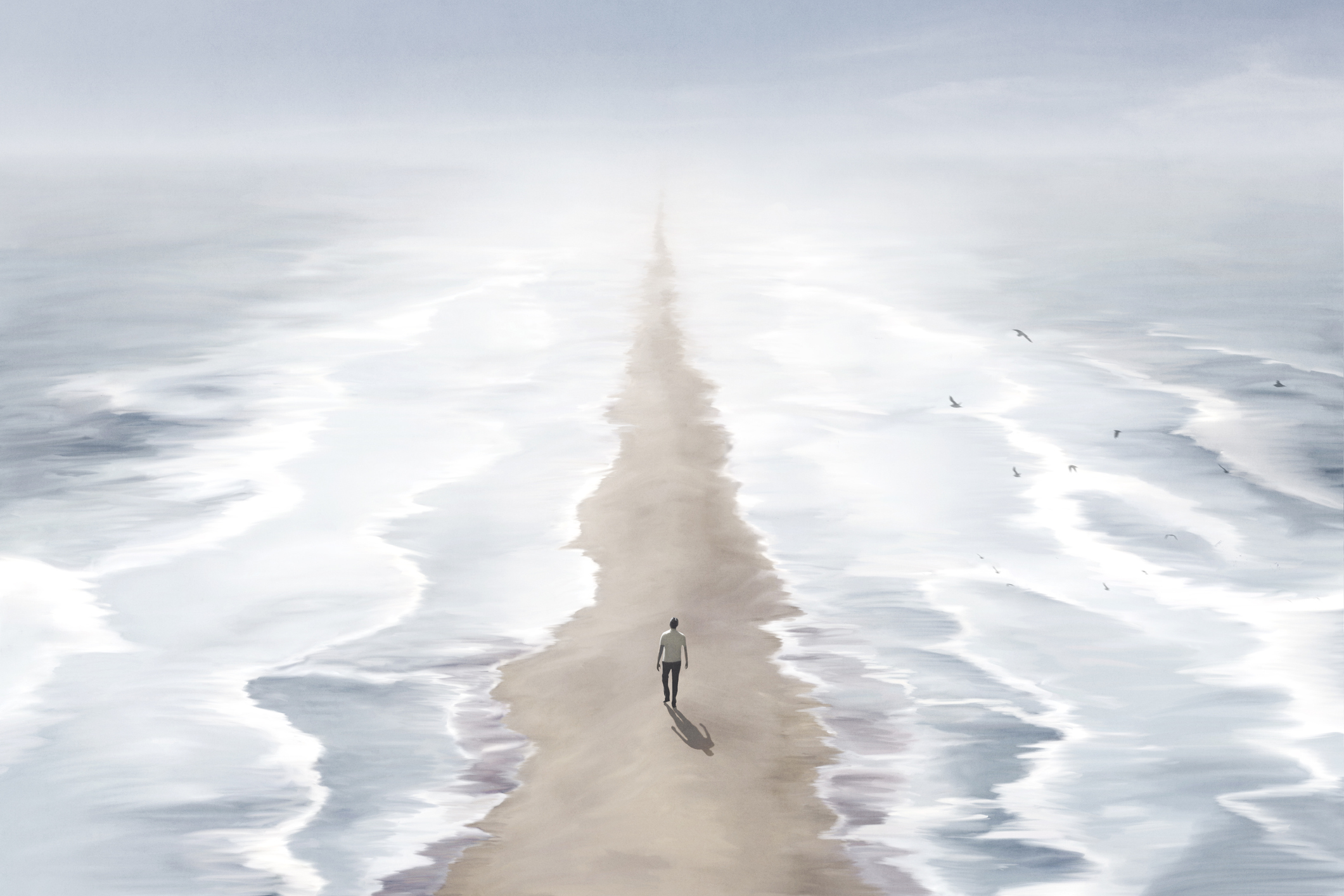 Person Walking on beach between waves
