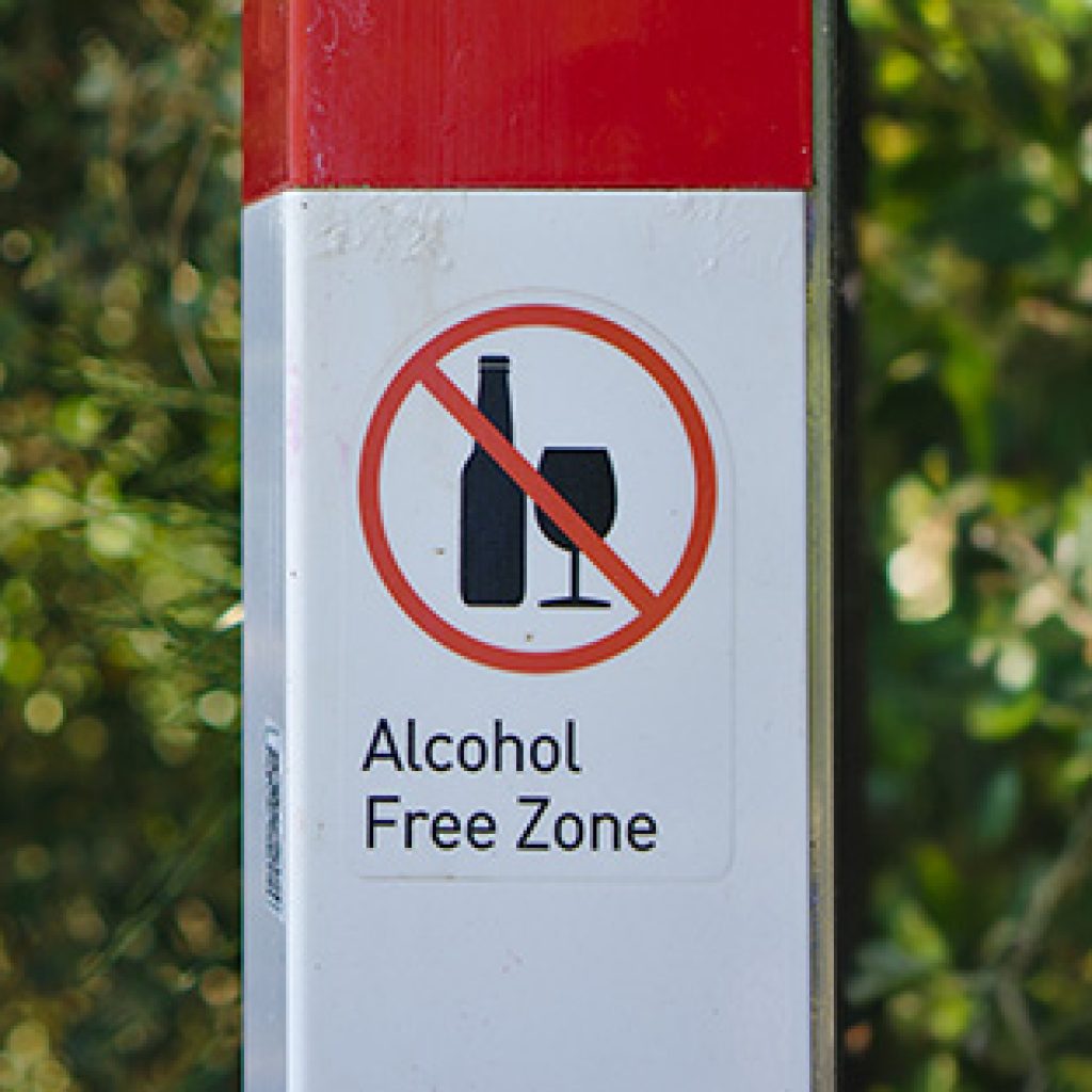 outdoor sign that says alcohol free zone