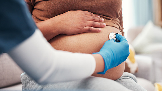 pregnant woman and nurse