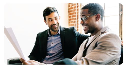 Two men talking and listening.