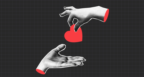 one hand giving a heart to another hand