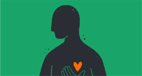 person holding their cartoon heart on their chest to signify self love