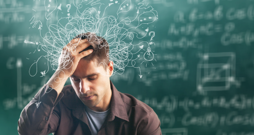 A man overwhelmed by his thoughts represented as scribbles