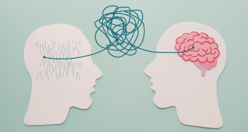 two silhouetted heads connected by a tangled line. one head has a brain the other has puzzle pieces